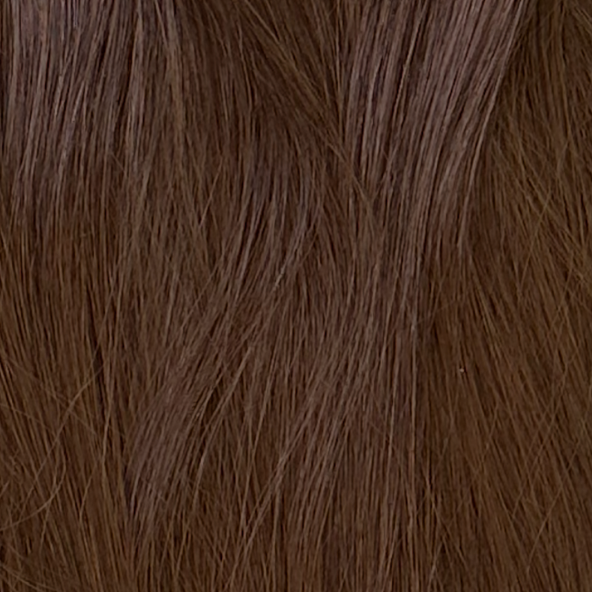 Close-up of brown hair extensions with a clear background